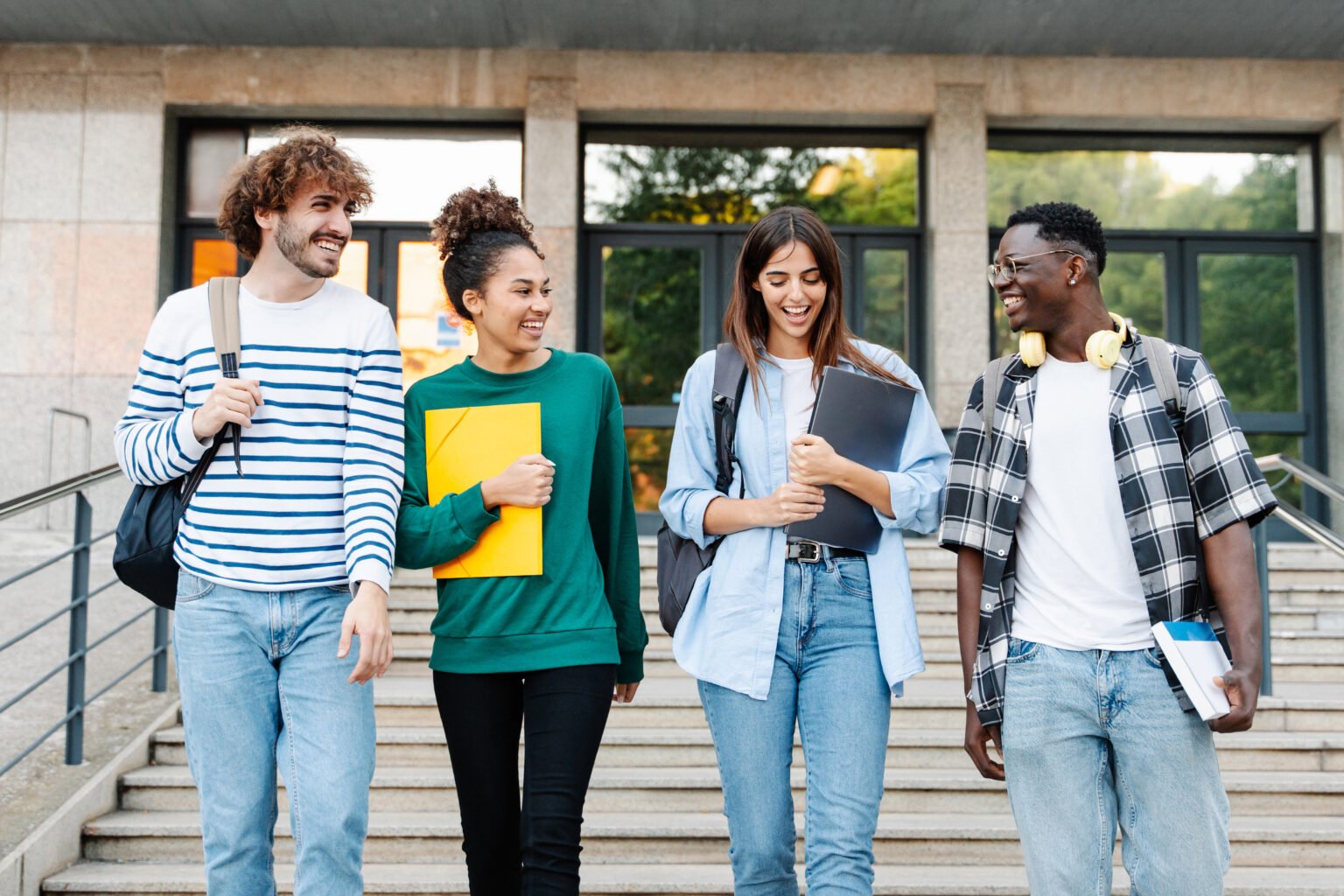 Students chatting and laughing together after class